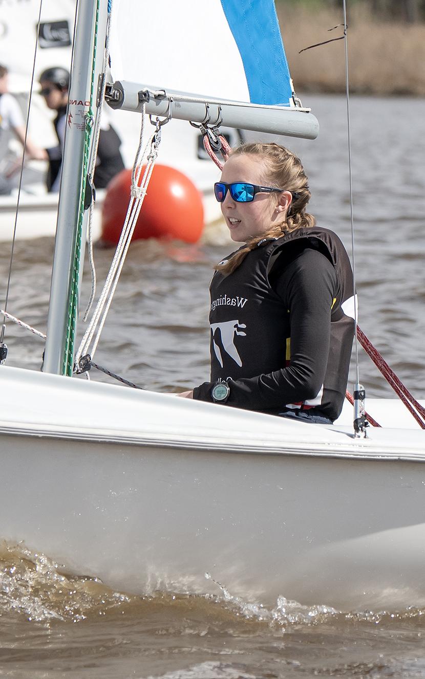 Rachel Morgen on a boat during a sailing race.